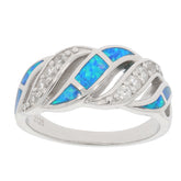 Round blue opal sterling silver ring with wave design and sparkling accents for elegant style.